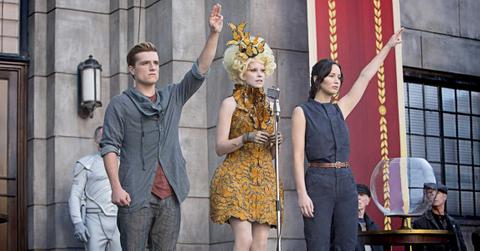 Peeta, Effie, and Katniss on a Panem tour in 'The Hunger Games'