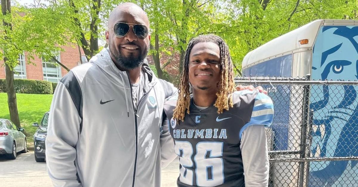 Mike Tomlin with his son at his football game.