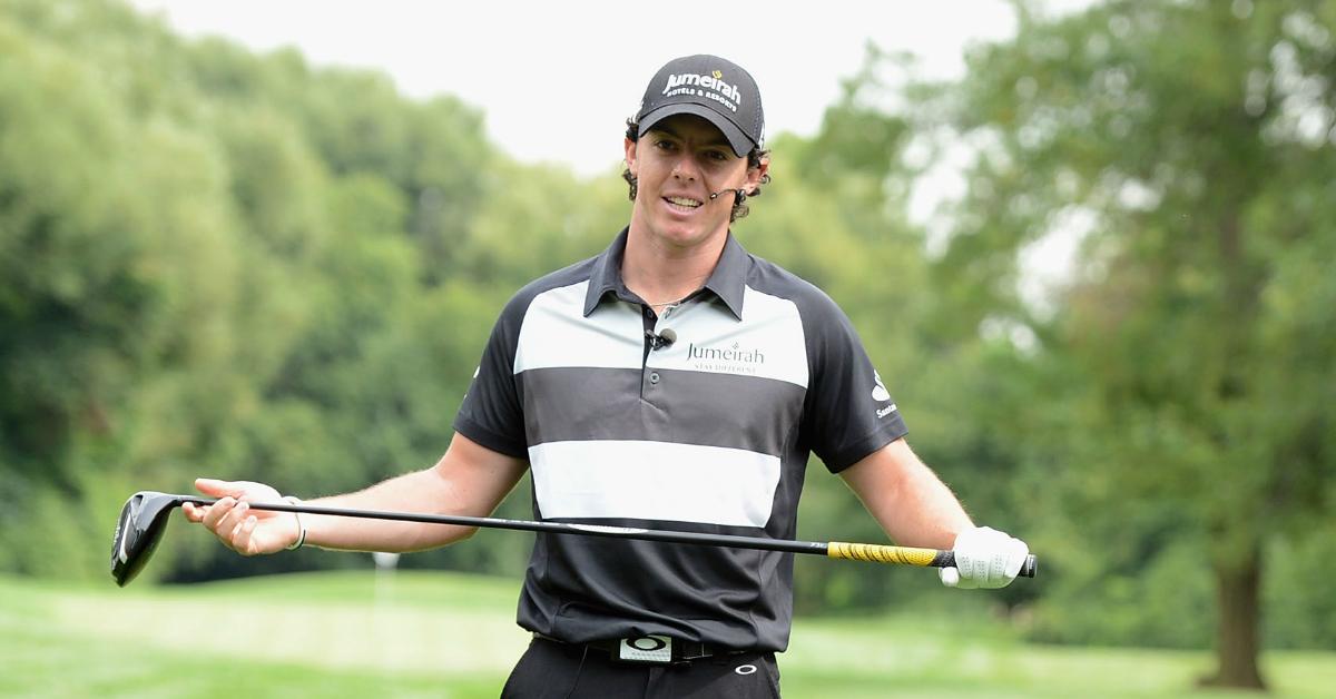 Rory McIlroy posing with golf club