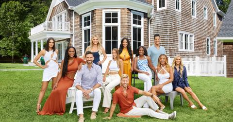 The cast of 'Summer House' Season 7 poses outside of the house.