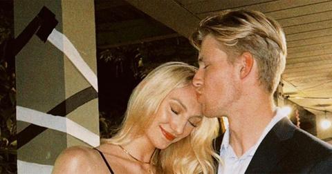 Ben Felter giving Cameron Brink a kiss on the forehead.