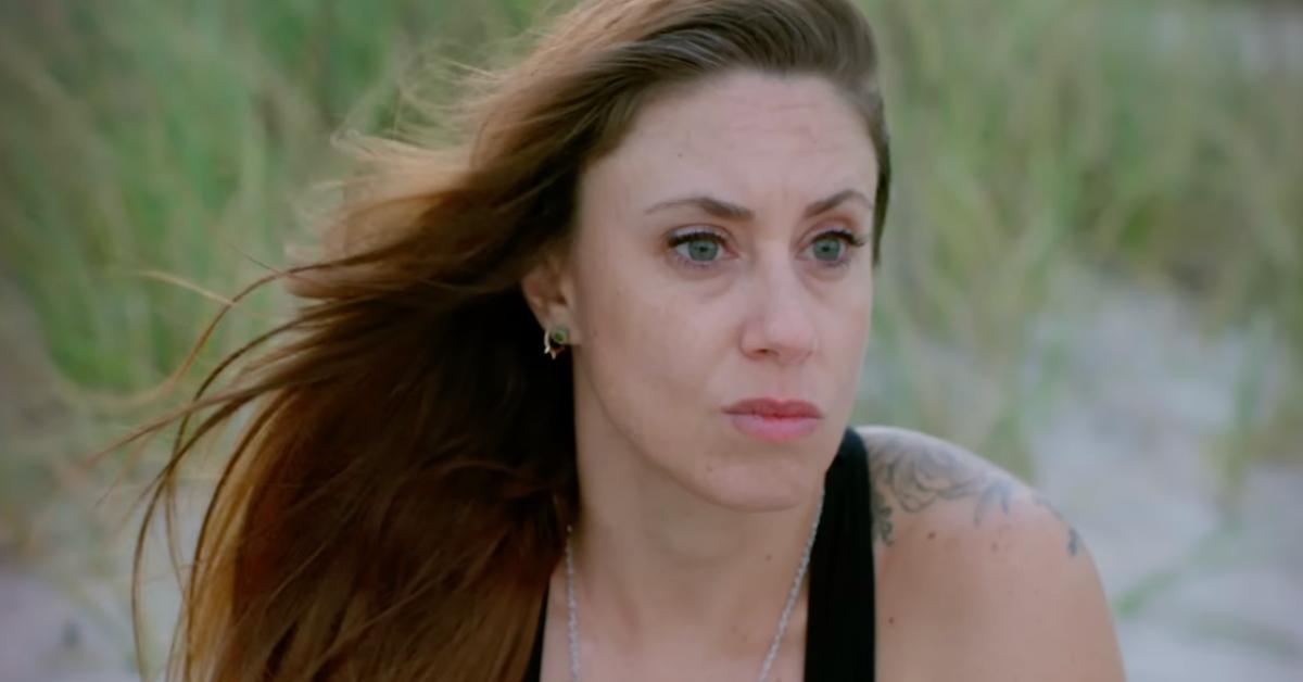 Casey Anthony sits on a beach