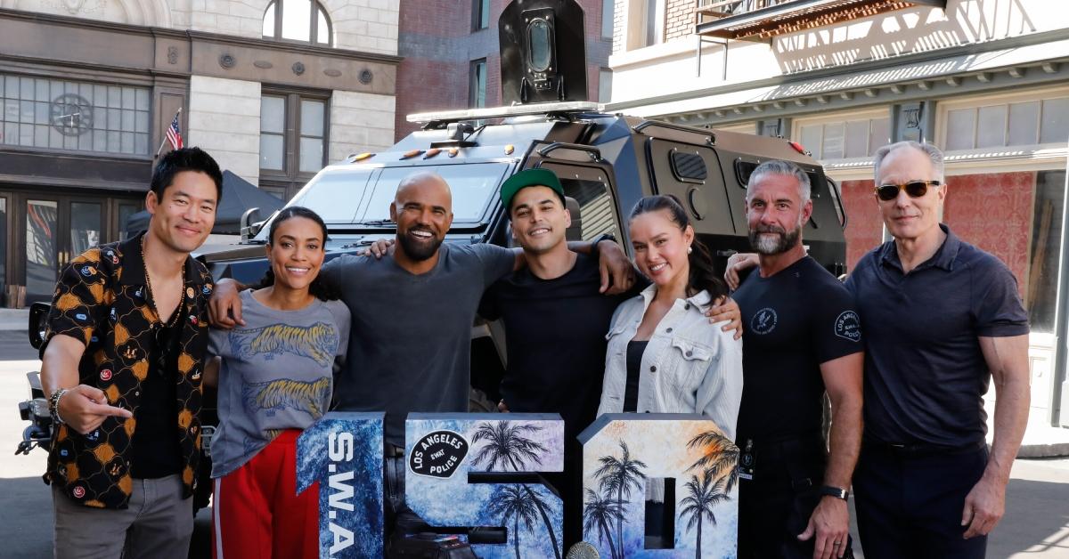 'S.W.A.T.' cast celebrating the show's 150 episodes.