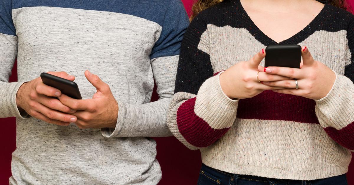 Two people on cell phones