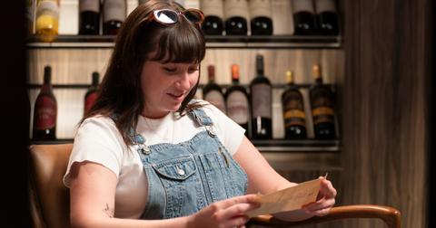 Gracie Lou with a wine bottle clue on Claim to Fame