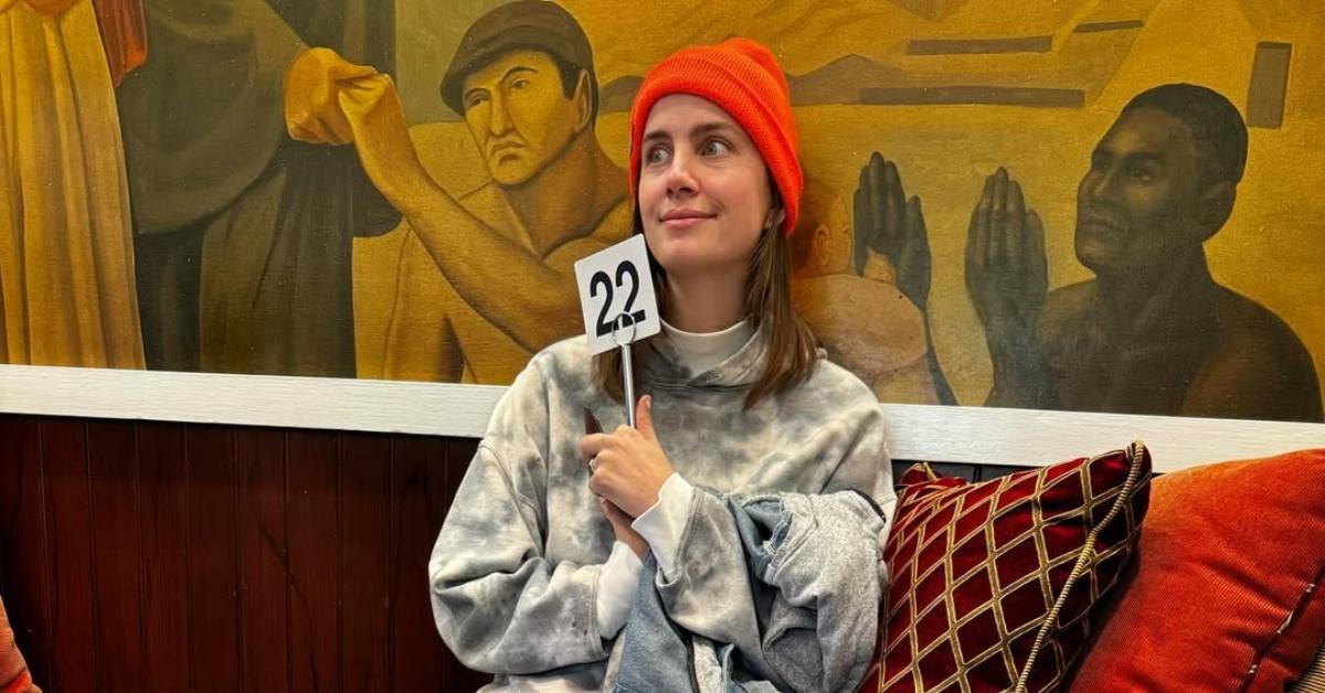 Vic Michaelis sitting down and posing