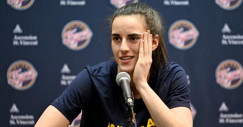 Caitlin Clark giving a press conference following a WNBA game.