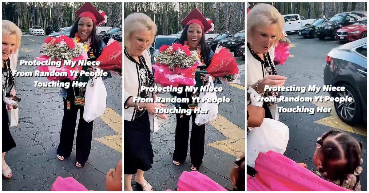 White woman tries to touch Black toddler in stroller, toddler's mom holds graduation gifts.