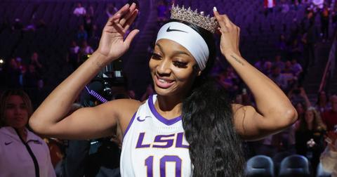 Angel Reese is given a crown as she is introduced before a game during the Naismith Basketball Hall of Fame Series on Nov. 6, 2023 in Las Vegas.