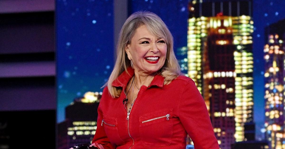 Roseanne Barr in red outfit with blond hair, visiting FOX News Channel’s "Gutfeld!" on February 14, 2023 in New York City. (Photo by Steven Ferdman/Getty Images)