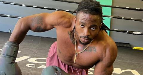 Zion Clark in a boxing ring with gloves on.