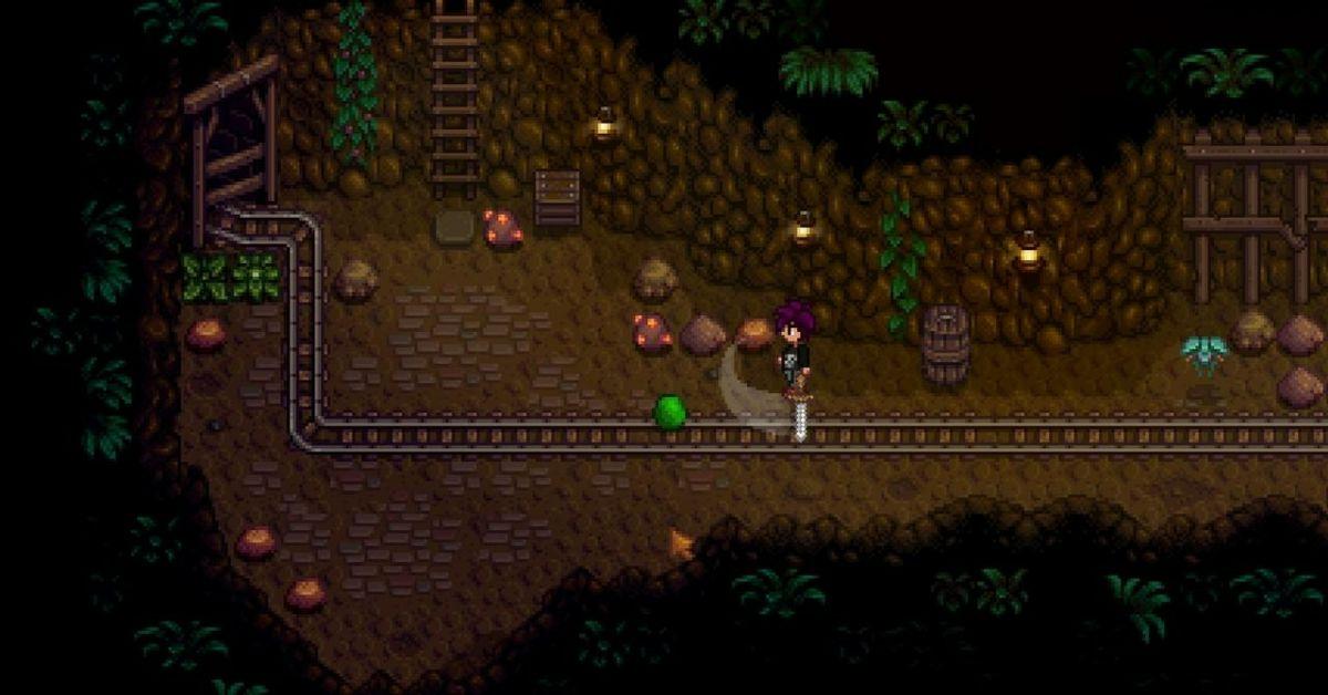 A player fighting a slime in Stardew Valley.