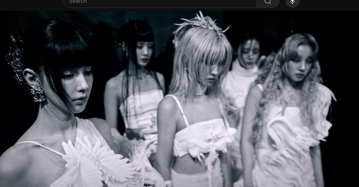 I-DLE in a video in black and white. 