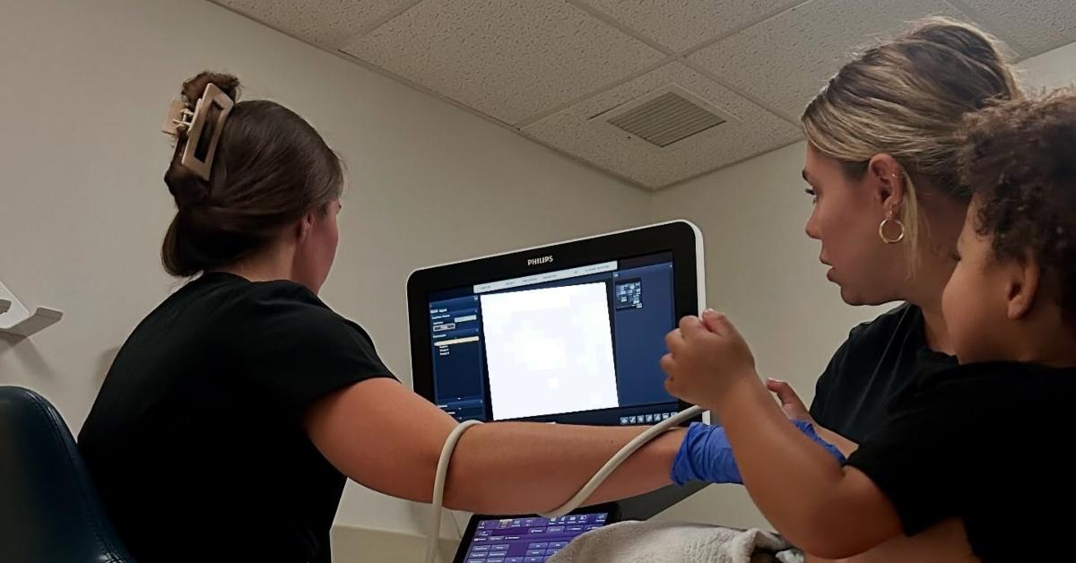Kail Lowry holds her son Rio while he gets a medical scan