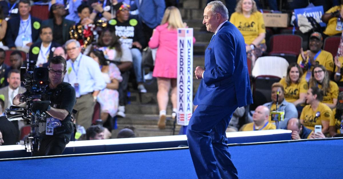 US Senate Majority Leader Chuck Schumer (D-NY) dances as he arrives onstage to speak on the second day of the Democratic National Convention (DNC) at the United Center in Chicago, Illinois, on August 20, 2024. Vice President Kamala Harris will formally accept the party's nomination for president at the DNC which runs from August 19-22 in Chicago. (Photo by SAUL LOEB / AFP) (Photo by SAUL LOEB/AFP via Getty Images)