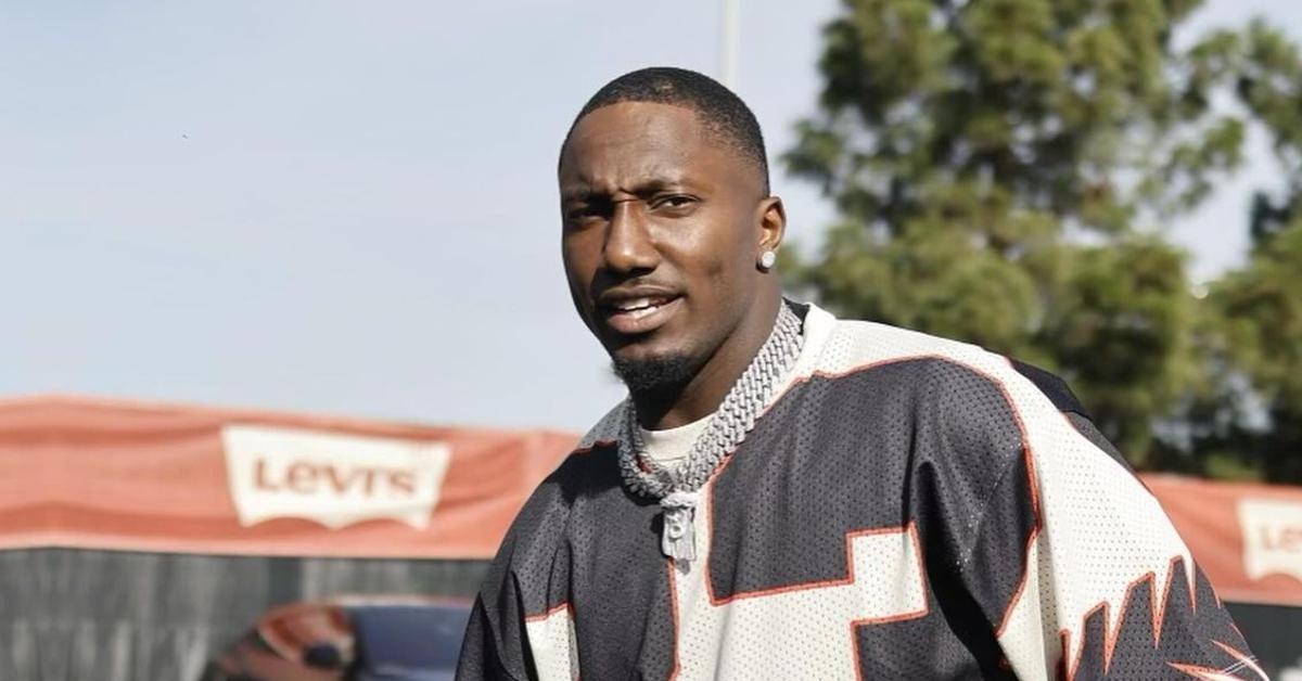 Deebo Samuel walking across a parking lot.