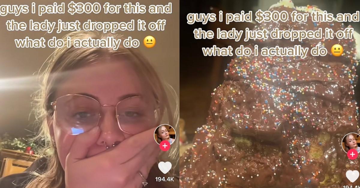 A woman shows off the ugly cake she paid $300 for 