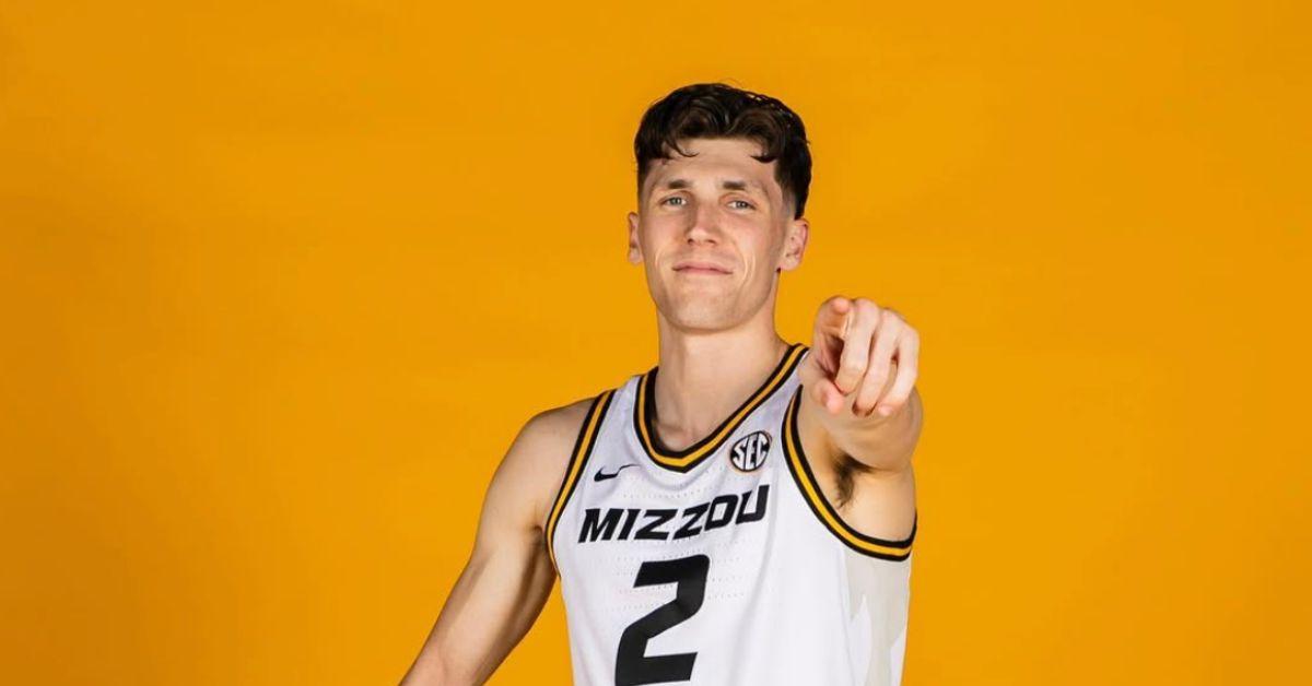 Caleb Grill pointing in his Missouri jersey. 