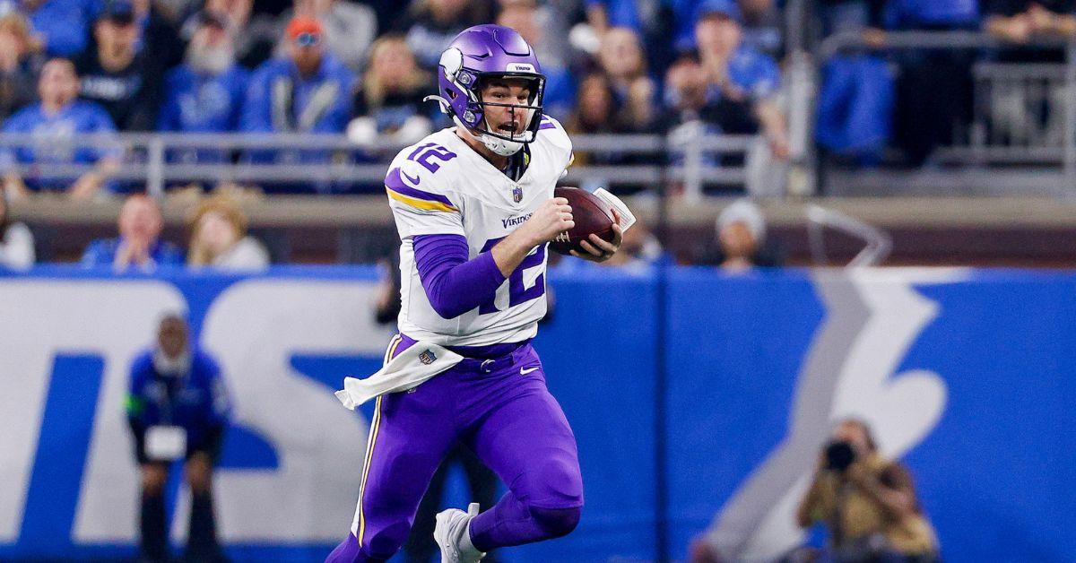 Nick Mullens #12 of the Minnesota Vikings runs the ball up the field during the first half of a game against the Detroit Lions 