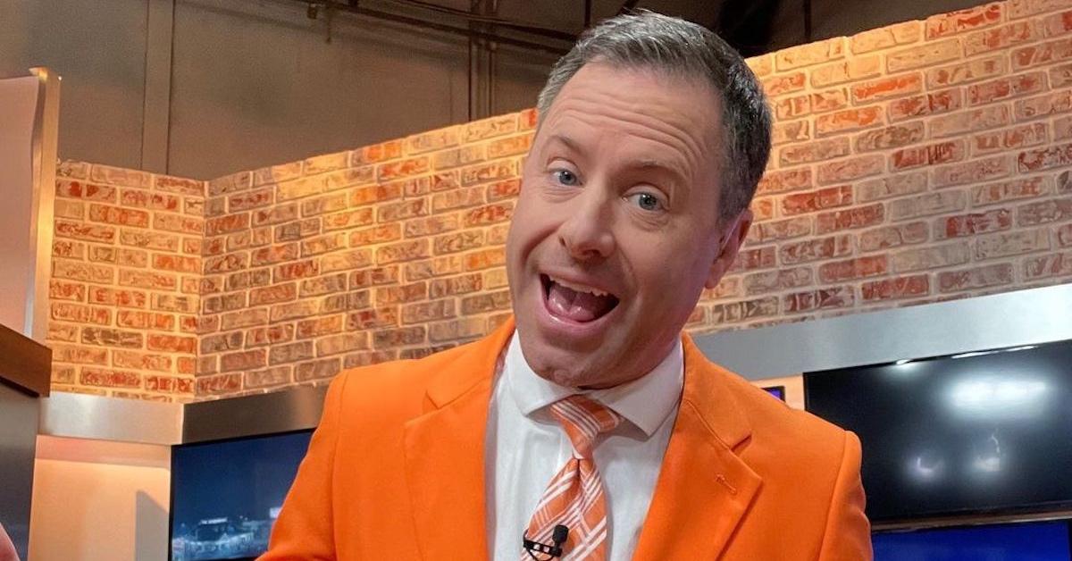 Mike Witcher wearing an orange suit