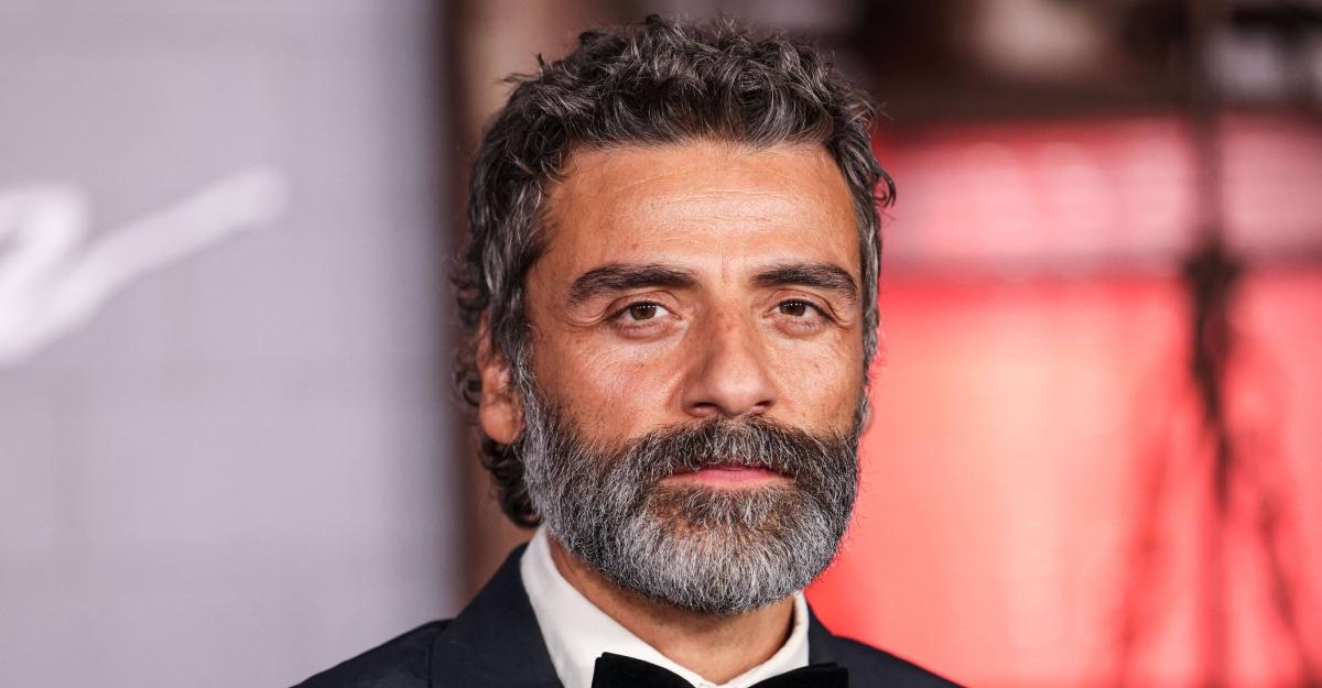 Oscar Isaac on the red carpet for Frankenstein wearing a bow tie