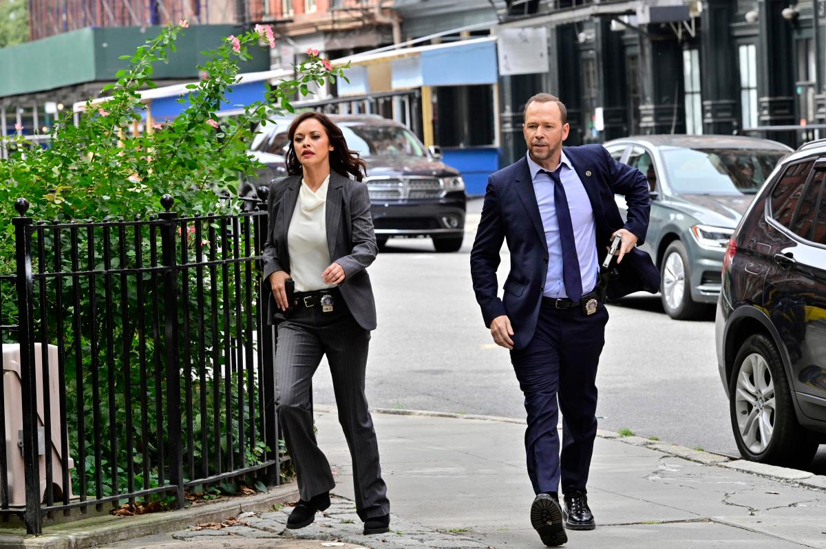 Detective Baez and Detective Reagan at a crime scene on 'Blue Bloods'.