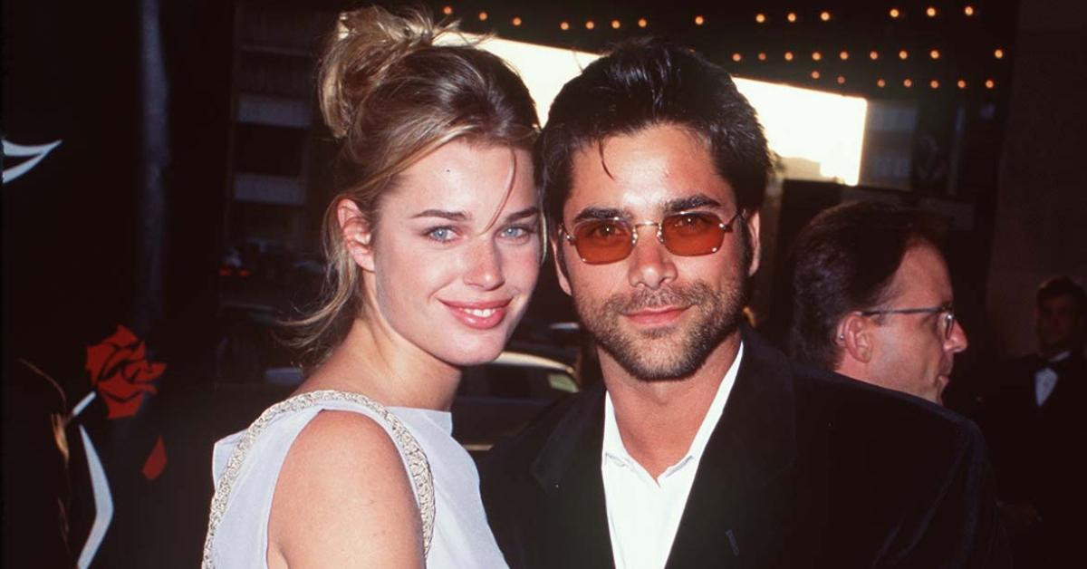 Rebecca Romijn and John Stamos at a benefit