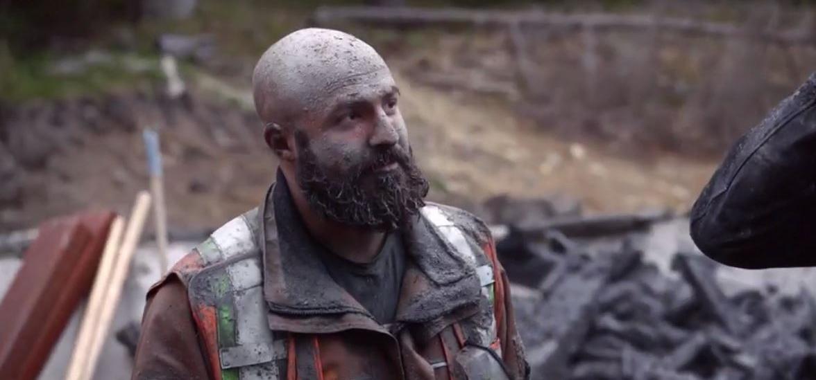 Jack from The Curse of Oak Island covered in mud.