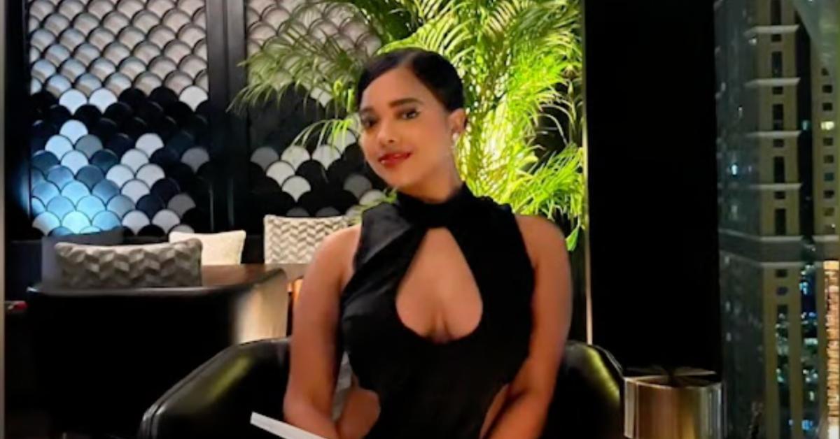 Elizabeth Polanco De Los Santos in a black dress