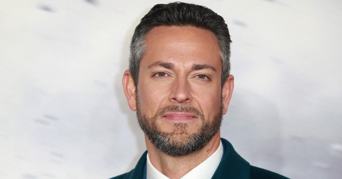 Zachary Levi posing for a press photo