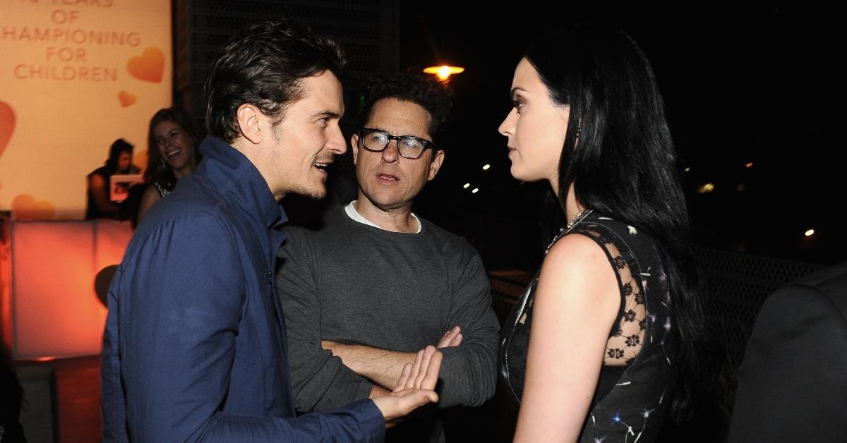 Katy Perry and Orlando Bloom with J.J. Abrams in 2017 at Coach's 3rd Annual Evening of Cocktails and Shopping to Benefit the Children's Defense Fund