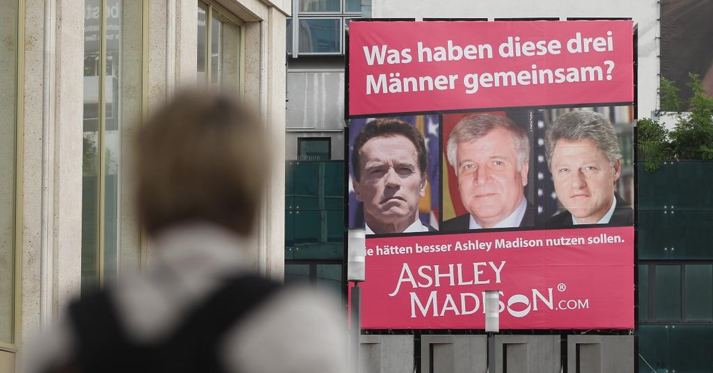 Is Infidelity Website Ashley Madison Still Active Details EXCLUSIVE   Man Walks Past Ashley Madison Advertisement In Berlin Germany 1688662033914 