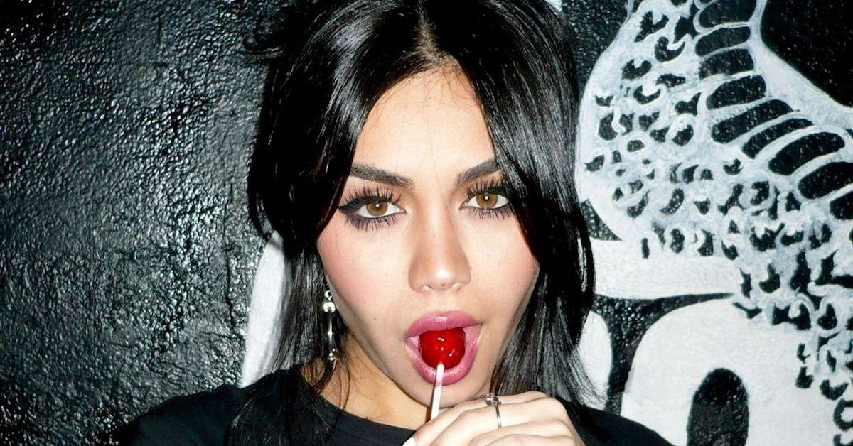 Tara Yummy with a lollipop on IG