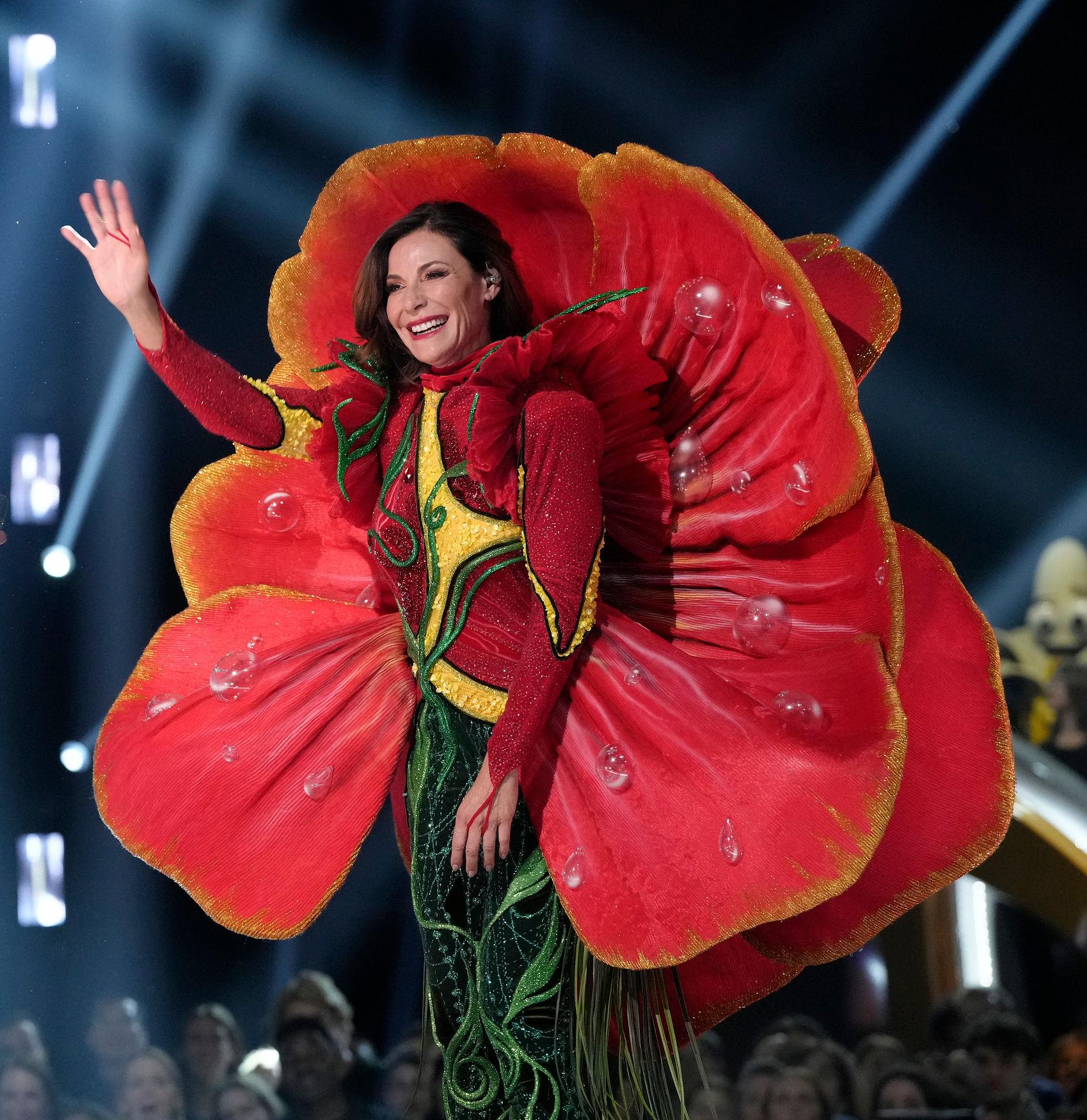 luann de lesseps rhony masked singer hibiscus