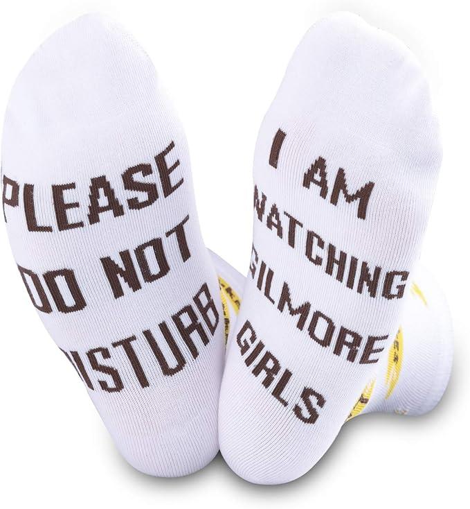 White socks that say "please do not disturb, I am watching gilmore girls"