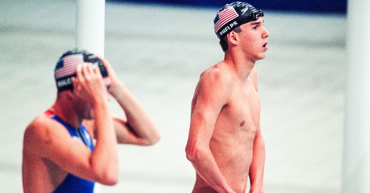 Michael Phelps of the USA in action in the 200m Butterfly heats with Tom Malchow of USA during the Olympics at the Sydney International Aquatic Centre on September 18th, 2000 in Sydney, Australia. (Photo by Simon Bruty/Anychance/Getty Images)