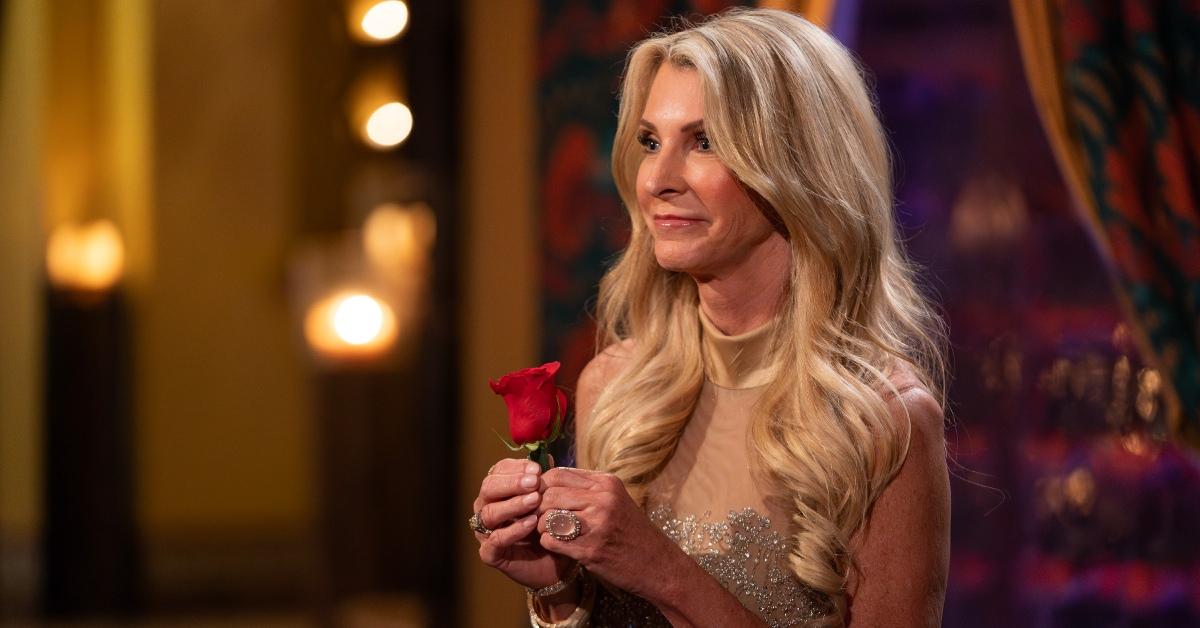 Joan holding a rose on 'The Golden Bachelorette'