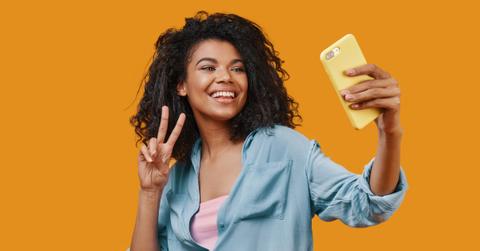 Young black woman taking a selfie