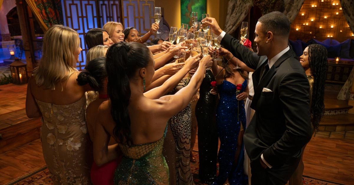 'The Bachelor' Season 29 cast clinks their champagne glasses together after the first rose ceremony.