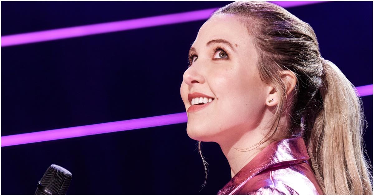 Taylor Tomlinson looking off camera while doing comedy