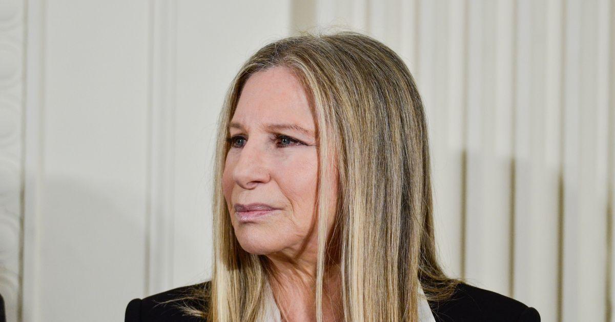 Barbra Streisand listens as President Barack Obama speaks during the 2015 Presidential Medal Of Freedom Ceremony at the White House