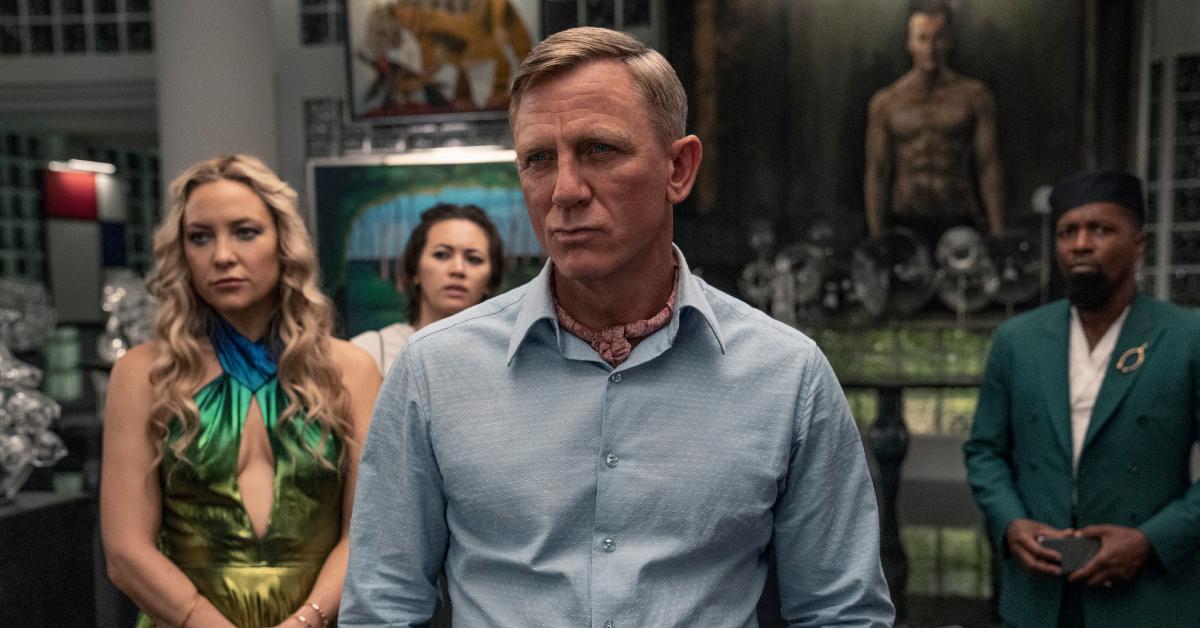 Kate Hudson as Birdie Jay, Jessica Henwick as Peg, Daniel Craig as Detective Benoit Blanc, and Leslie Odom Jr. as Lionel Toussaint in 'Glass Onion: A Knives Out Mystery.'