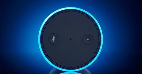 An Amazon Alexa giving off a blue light