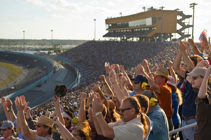 Still shot of NASCAR viewers watching a race