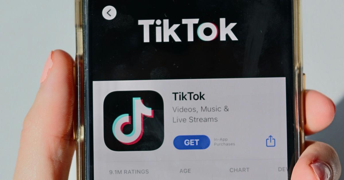 TikTok on a phone being held in a person's hand