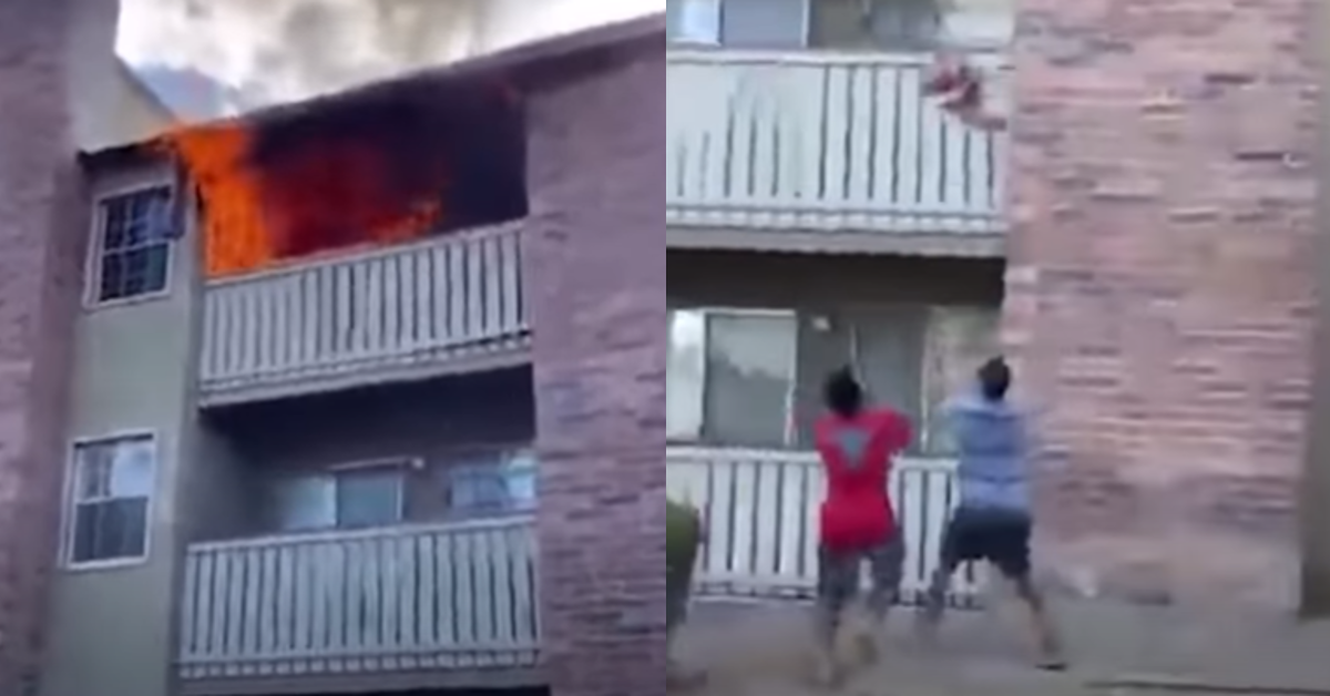 man catches toddler burning building