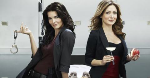 rizzoli and isles promo photo with handcuffs and apple