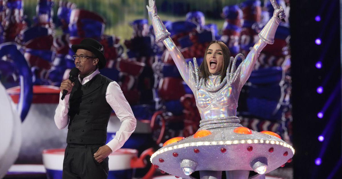 Host Nick Cannon with Olivia Culpo as UFO on 'The Masked Singer'