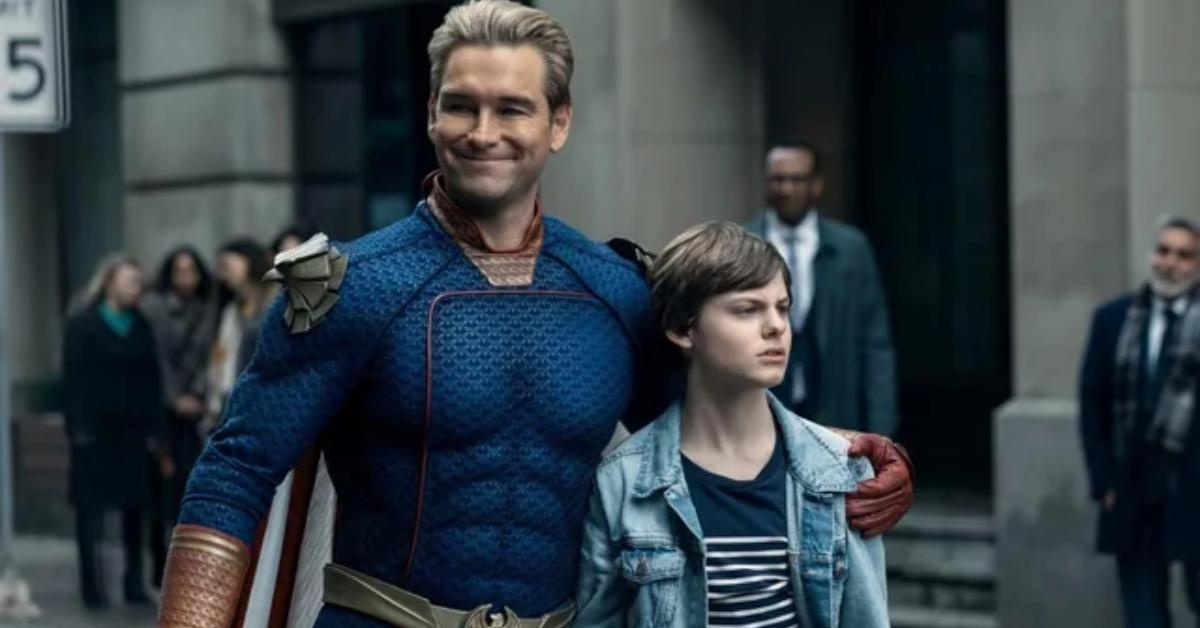 Homelander and Ryan greet a crowd of people on The Boys.