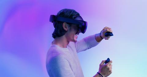 Key art of the Meta Quest 2 worn by a player.